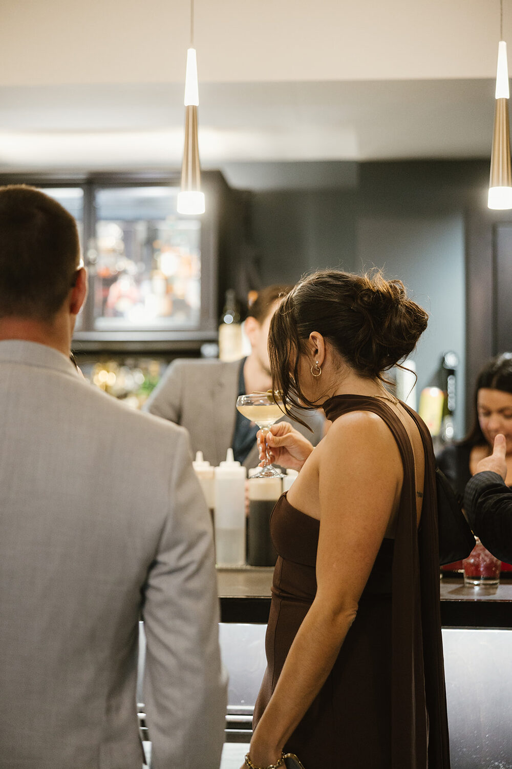 Guest with a cocktail at the bar